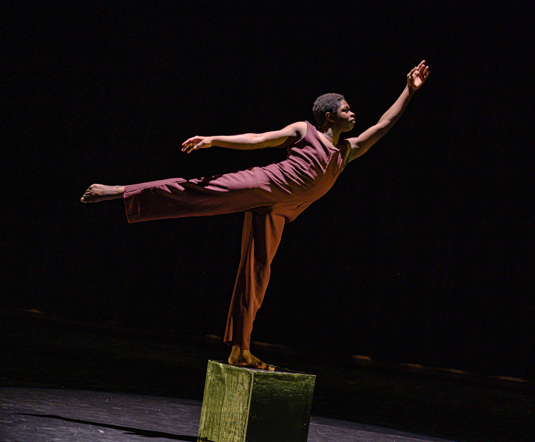 A Coker student performing on stage solo