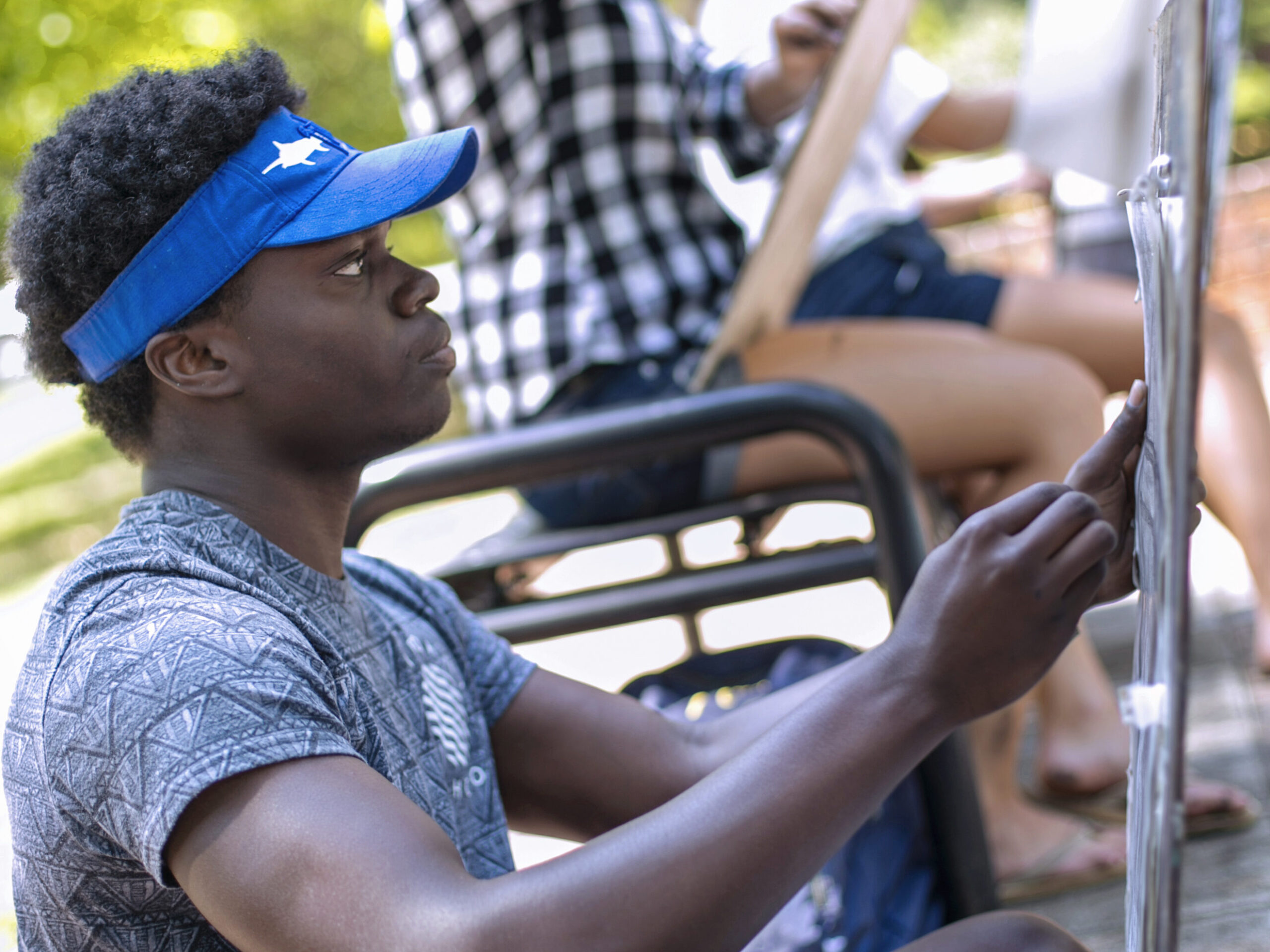 Students paint outdoors