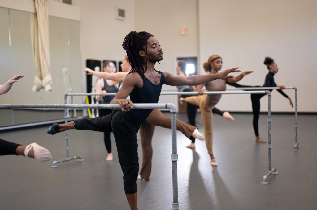A dancer practices in class.
